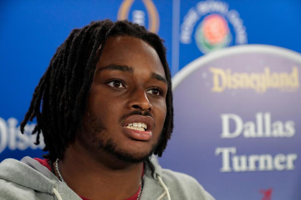 Alabama linebacker Dallas Turner speaks to reporters during a welcome event for the team at Disneyland on Wednesday, Dec. 27, 2023, in Anaheim, California.