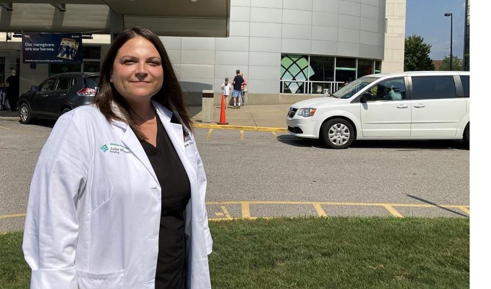 Saint Vincent Hospital continues to see a significant number of flu patients, though COVID-19 admissions have declined in recent weeks, said Dr. Courtney Sampson, a Saint Vincent hospitalist shown in a 2021 file photo.