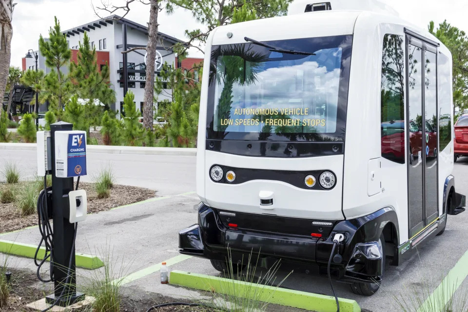 Florida, Babcock Ranch, autonomous electric vehicle at charging station. (Photo by: Jeffrey Greenberg/Education Images/Universal Images Group via Getty Images)