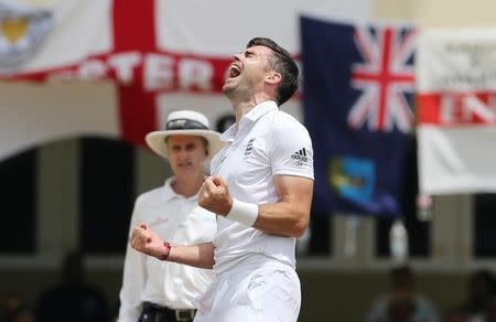 Cricket - West Indies v England - First Test - Sir Vivian Richards Stadium, Antigua - 17/4/15 England's James Anderson celebrates taking the wicket of West Indies' Marlon Samuels who was caught by James Tredwell which equals the record for the most test wickets for an England player Action Images via Reuters / Jason O'Brien