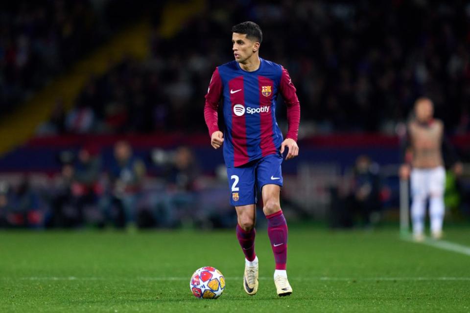 BARCELONA, SPAIN – MARCH 12: Joao Cancelo of <a class="link " href="https://sports.yahoo.com/soccer/teams/barcelona/" data-i13n="sec:content-canvas;subsec:anchor_text;elm:context_link" data-ylk="slk:FC Barcelona;sec:content-canvas;subsec:anchor_text;elm:context_link;itc:0">FC Barcelona</a> runs with the ball during the UEFA Champions League 2023/24 round of 16 second leg match between FC Barcelona and <a class="link " href="https://sports.yahoo.com/soccer/teams/napoli/" data-i13n="sec:content-canvas;subsec:anchor_text;elm:context_link" data-ylk="slk:SSC Napoli;sec:content-canvas;subsec:anchor_text;elm:context_link;itc:0">SSC Napoli</a> at Estadi Olimpic Lluis Companys on March 12, 2024 in Barcelona, Spain. (Photo by Alex Caparros/Getty Images) (Photo by Alex Caparros/Getty Images)