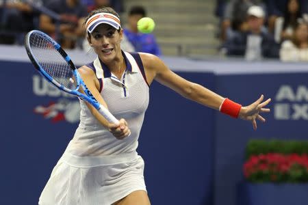 Sep 3, 2017; New York, NY, USA; Garbine Muguruza of Spain misses a volley against Petra Kvitova of the Czech Republic (not pictured) in the first set tie-breaker on day seven of the U.S. Open tennis tournament at USTA Billie Jean King National Tennis Center. Mandatory Credit: Geoff Burke-USA TODAY Sports