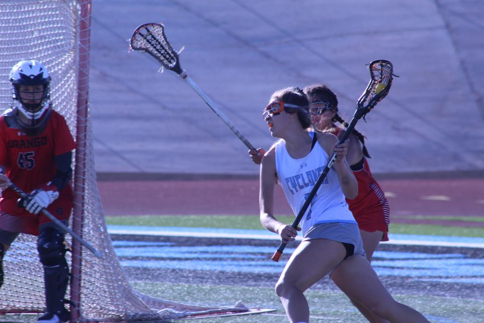 Morgan Avila (#7) drives past her defender before taking a shot on goal against Durango in the CHSAA Class 4A first-round playoff game on May 10, 2022.