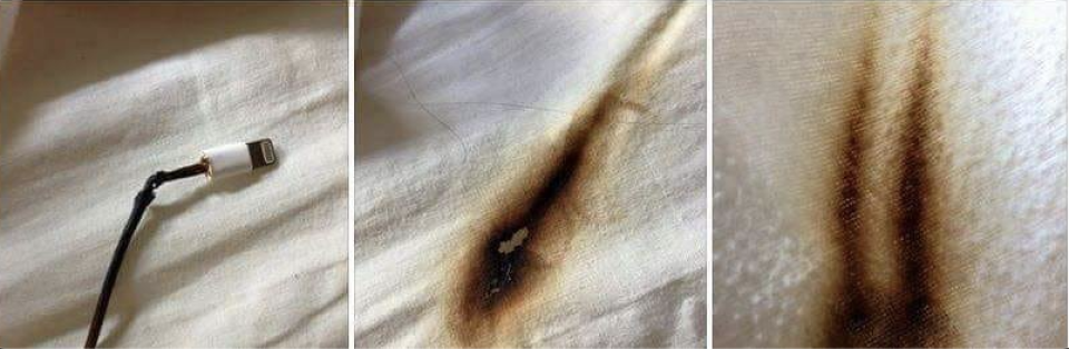 More burn marks from a phone charger shown close up on a bed.