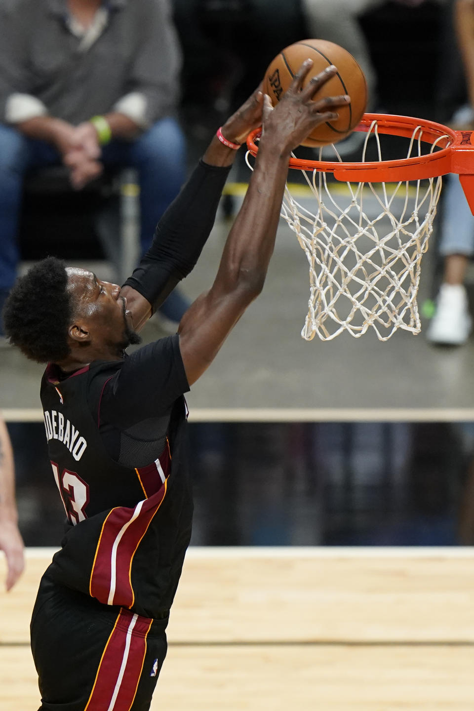 Miami Heat center Bam Adebayo dunks during the second half of an NBA basketball game against the Brooklyn Nets, Sunday, April 18, 2021, in Miami. (AP Photo/Wilfredo Lee)