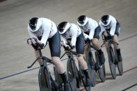 Team Germany competes during a qualifying heat for track cycling women's team pursuit at the 2020 Summer Olympics, Monday, Aug. 2, 2021, in Izu, Japan. (AP Photo/Christophe Ena)