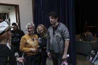 This photo provided by Jack Caswell shows director of photography Halyna Hutchins, third from left, director's assistant Izzy Lee, and director Adam Egypt Mortimer on the set of "Archenemy" on January 10, 2020, in Los Angeles. Hutchins was fatally shot by Alec Baldwin Thursday on the New Mexico set of the western film "Rust." Authorities continue to investigate the shooting but there are no allegations of wrongdoing by Baldwin. (Jack Caswell via AP)