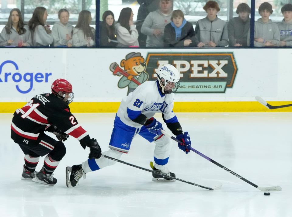 Olentangy Liberty's Jake Struck (right) and St. Charles' Sean Moore