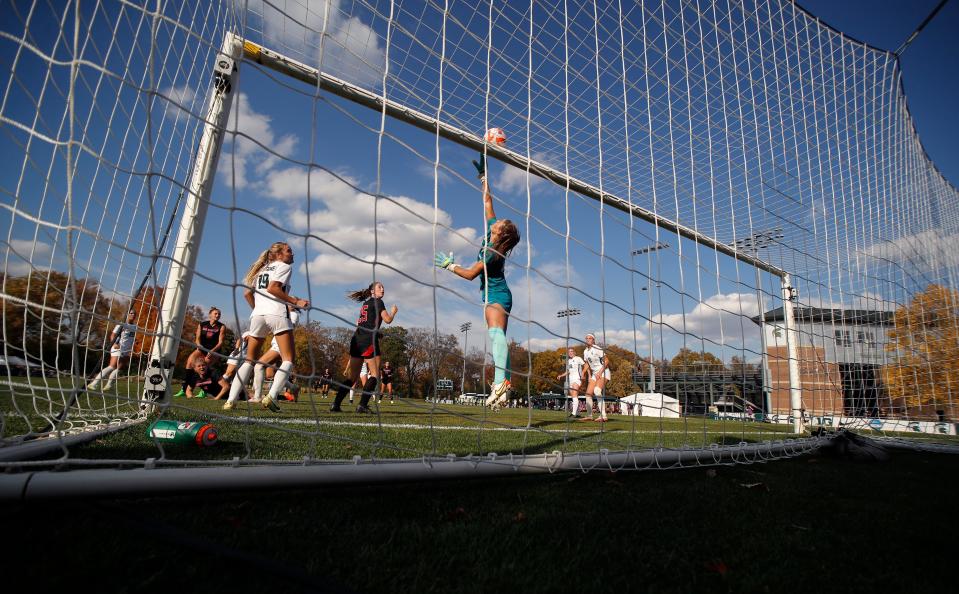 Michigan State goalkeeper Lauren Kozal deflects a Rutgers shot over the goal, Sunday, Oct. 23, 2022, in East Lansing.