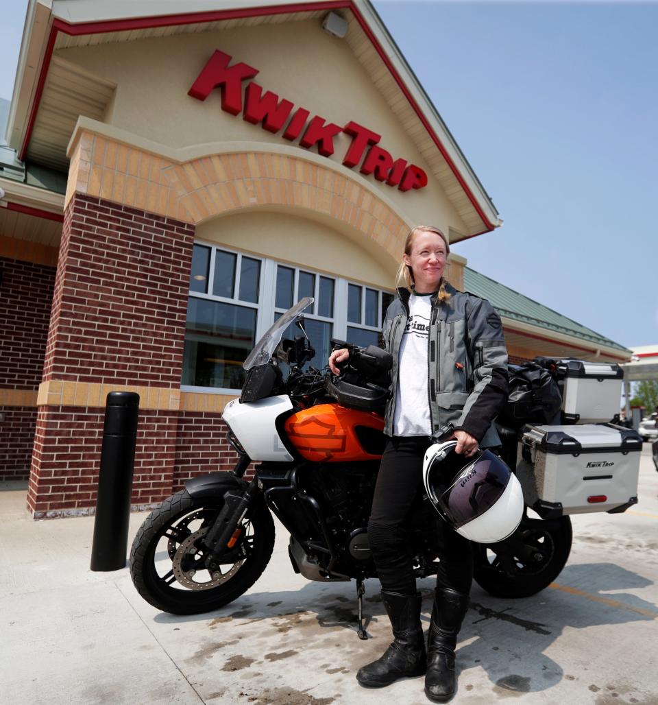 Ripon resident Whit Meza stands outside Kwik Trip in Sturgeon Bay on May 17, 2023, after completing her goal to visit every store in the state on an 11-day motorcycle trip.