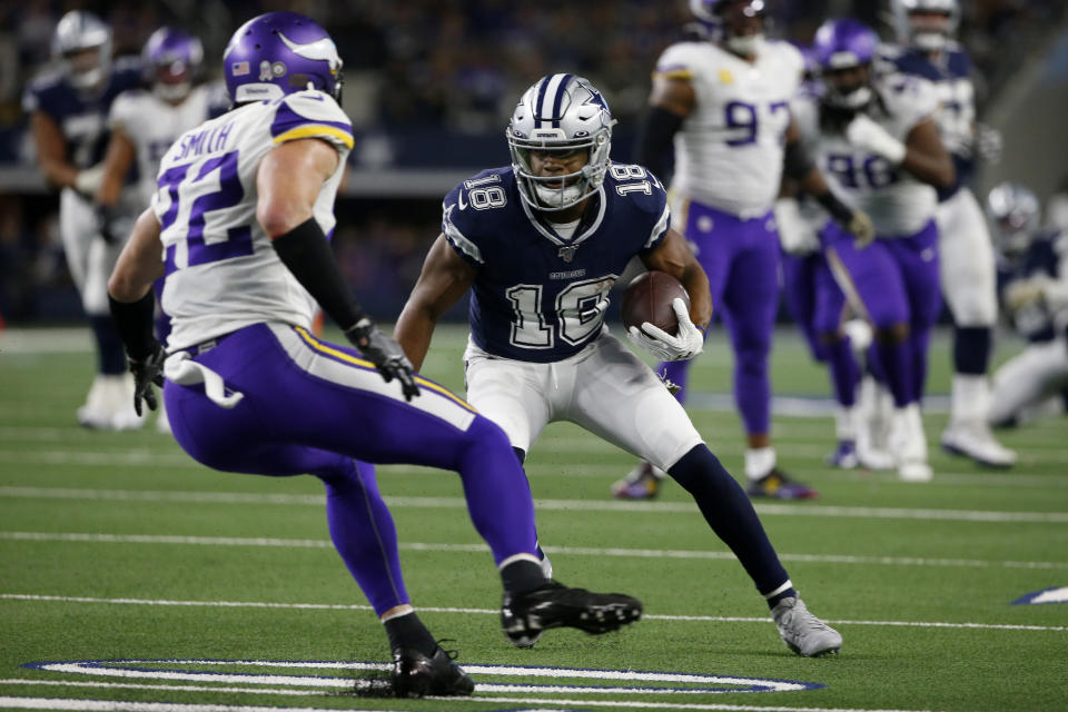 Minnesota Vikings' Harrison Smith (22) defends as Dallas Cowboys' Randall Cobb (18) looks for running room after catching a pass during the second half of an NFL football game in Arlington, Texas, Sunday, Nov. 10, 2019. (AP Photo/Ron Jenkins)