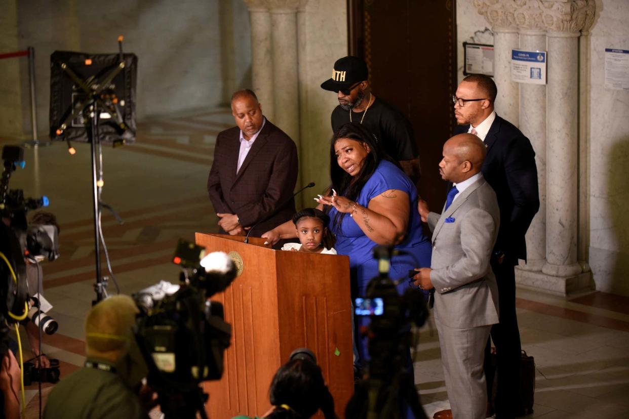 Roxie Washington, the mother of Geroge Floyd's 6-year-old daughter Gianna Floyd, addresses the press alongside her and their lawyers, at Minneapolis City Hall: Reuters