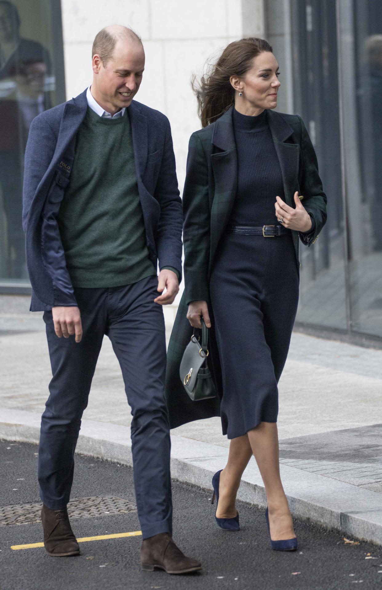 Kate Middleton and Prince William wave to crowds. (Getty Images)