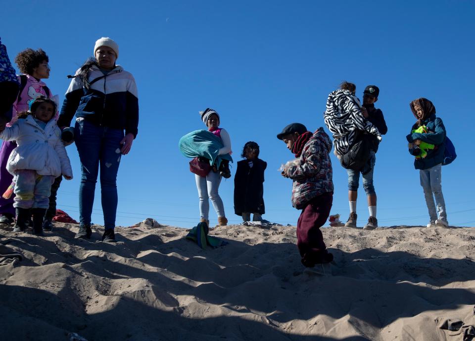 Migrants cross the Rio Bravo/Grande from Ciudad Juárez to El Paso hoping to seek asylum on Three Kings Day after cutting the Rosca de Reyes on Jan. 6, 2024.