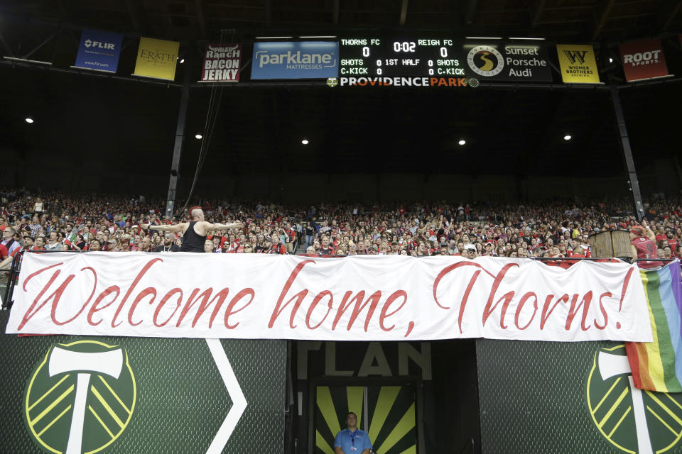 FILE - A sellout crowd of Portland Thorns fans display a sign in Providence Park before an NWSL soccer match against the Seattle Reign in Portland, Ore., Wednesday, July 22, 2015. The Portland Thorns have been acquired by the Bhathal family, investors in the NBA's Sacramento Kings, the National Women's Soccer League team announced Wednesday, Jan. 3, 2024. (AP Photo/Don Ryan, File)