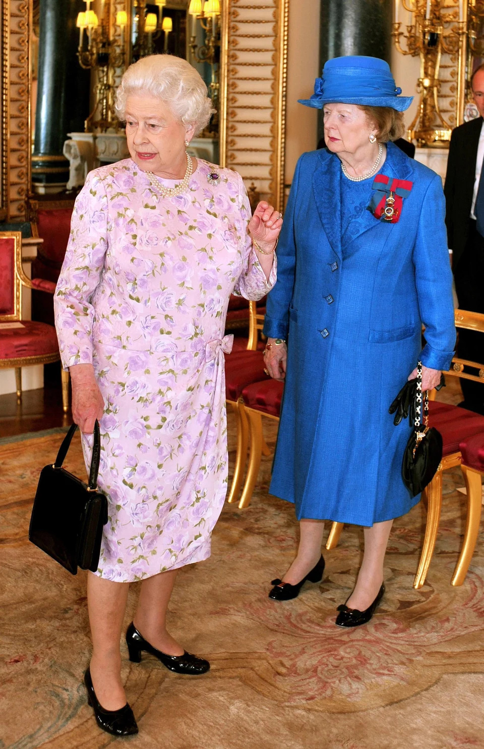 Queen Elizabeth II (left) and Baroness Margaret Thatcher before lunch for members of the Order of Merit at Buckingham Palace in London.   (Photo by John Stillwell - PA Images/PA Images via Getty Images)