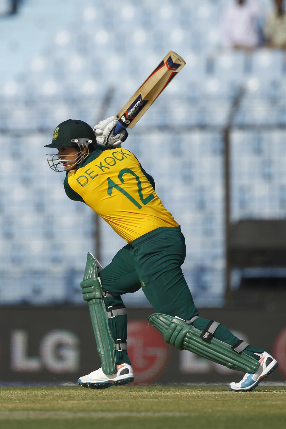 South Africa's Quinton de Kock plays a shot during their ICC Twenty20 Cricket World Cup match against New Zealand in Chittagong, Bangladesh, Monday, March 24, 2014. (AP Photo/A.M. Ahad)