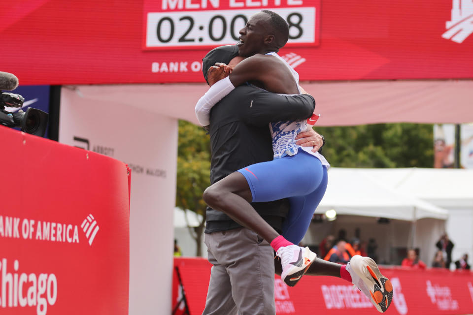 CHICAGO, ILLINOIS - OCTOBER 08: Kelvin Kiptum of Kenya celebrates after winning the 2023 Chicago Marathon professional men's division and setting a world record marathon time of 2:00.35 on October 08, 2023 in Chicago, Illinois. (Photo by Michael Reaves/Getty Images)
