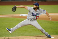 Los Angeles Dodgers starting pitcher Clayton Kershaw throws against the Atlanta Braves during the first inning in Game 4 of a baseball National League Championship Series Thursday, Oct. 15, 2020, in Arlington, Texas. (AP Photo/Eric Gay)