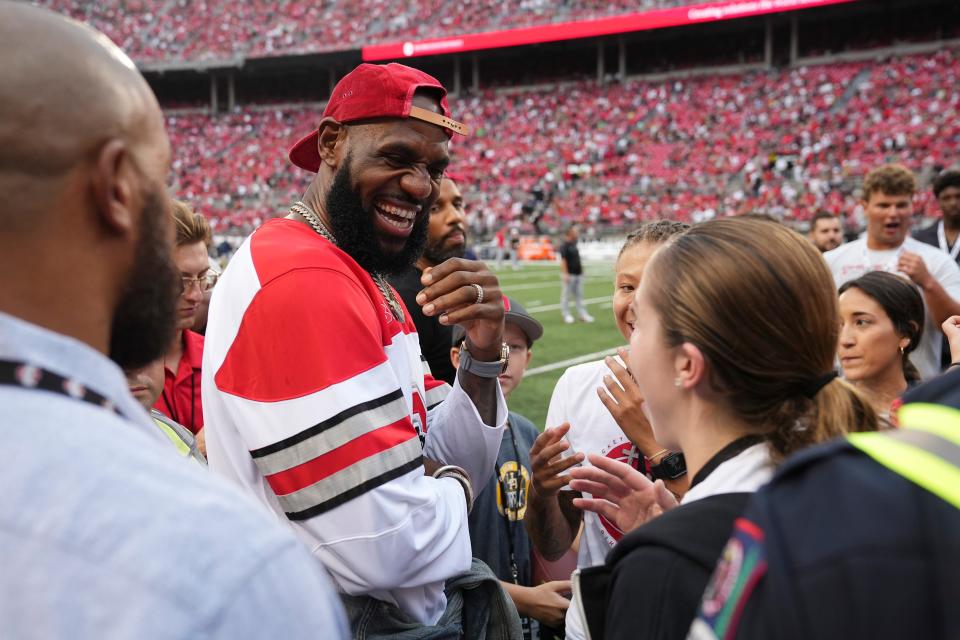 Sep 3, 2022; Columbus, Ohio, USA;  LeBron James talks to fans prior to the NCAA football game between the Ohio State Buckeyes and Notre Dame Fighting Irish at Ohio Stadium. Mandatory Credit: Adam Cairns-USA TODAY Sports