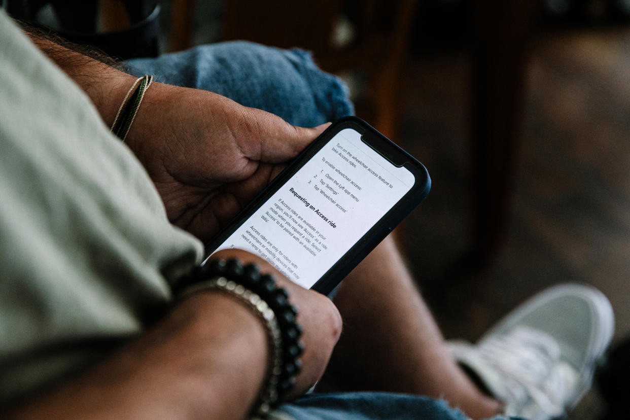 Joshua Cooper, a participant in the pending class-action lawsuit against LYFT, attempts to request an accessible vehicle through the LYFT app with no success. (Laurel Golio for NBC News)