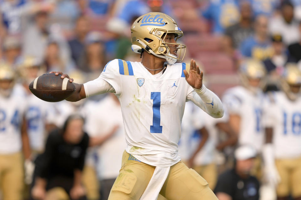 UCLA quarterback Dorian Thompson-Robinson (1) throws a pass against the Stanford during the second half of an NCAA college football game Saturday, Sept. 25, 2021, in Stanford, Calif. (AP Photo/Tony Avelar)