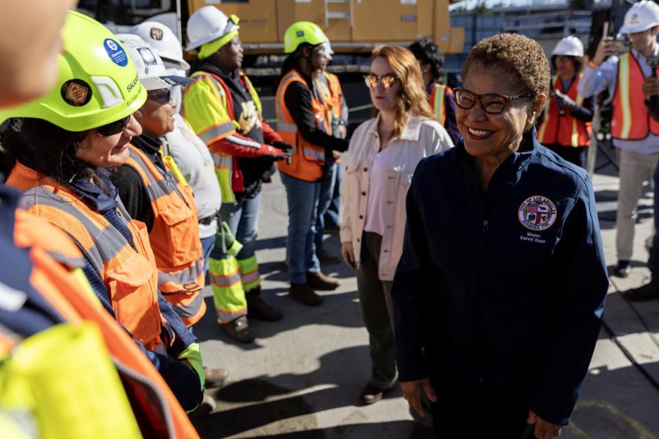 Mayor Karen Bass greets construction workers.