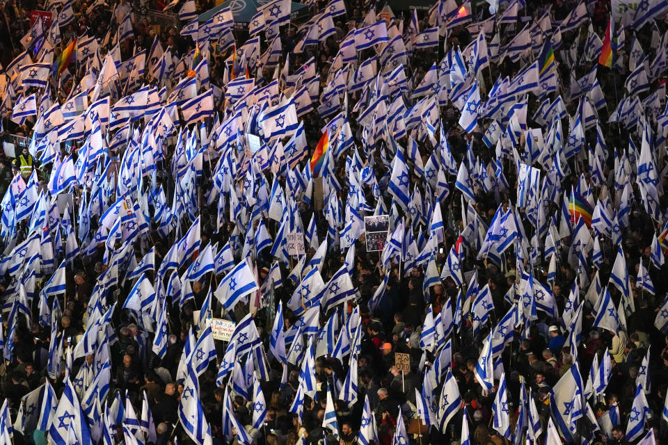 Israelis protest against plans by Prime Minister Benjamin Netanyahu's government to overhaul the Israel's judicial system, in Tel Aviv, Israel, Saturday, March 18, 2023. (AP Photo/Tsafrir Abayov)