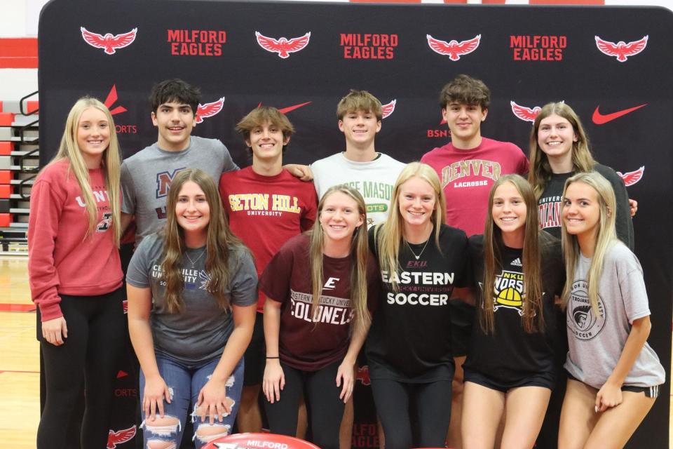 Milford High School celebrated its seniors who signed their letters of intent Nov. 8, 2023, as part of National Signing Day. They are, from left: Front, Isabella Zimmerman, Cedarville University softball; Peyton Smith, Eastern Kentucky University soccer; Ana Manning, Eastern Kentucky University soccer; Caitlin Evans, Northern Kentucky University soccer; Ashlyn Schaefer, Anderson University (South Carolina) soccer; back, Kaitlyn Flynn, University of Indianapolis softball; Andy Lopez, Malone University lacrosse; Jacob Wagner, Seton Hill University lacrosse; Louden Hilliard, George Mason University baseball; Luke Barkimer, University of Denver lacrosse; and Kelsey McKenney, University of Indianapolis volleyball.