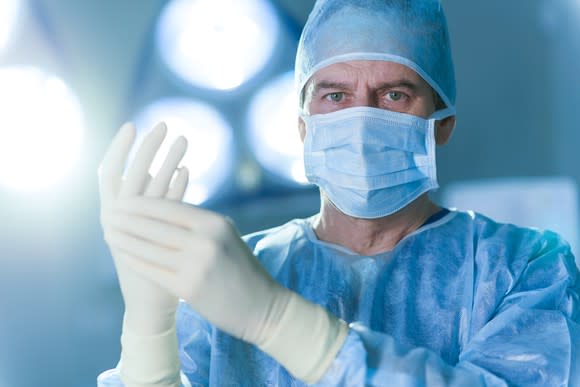 Surgeon with gloves on