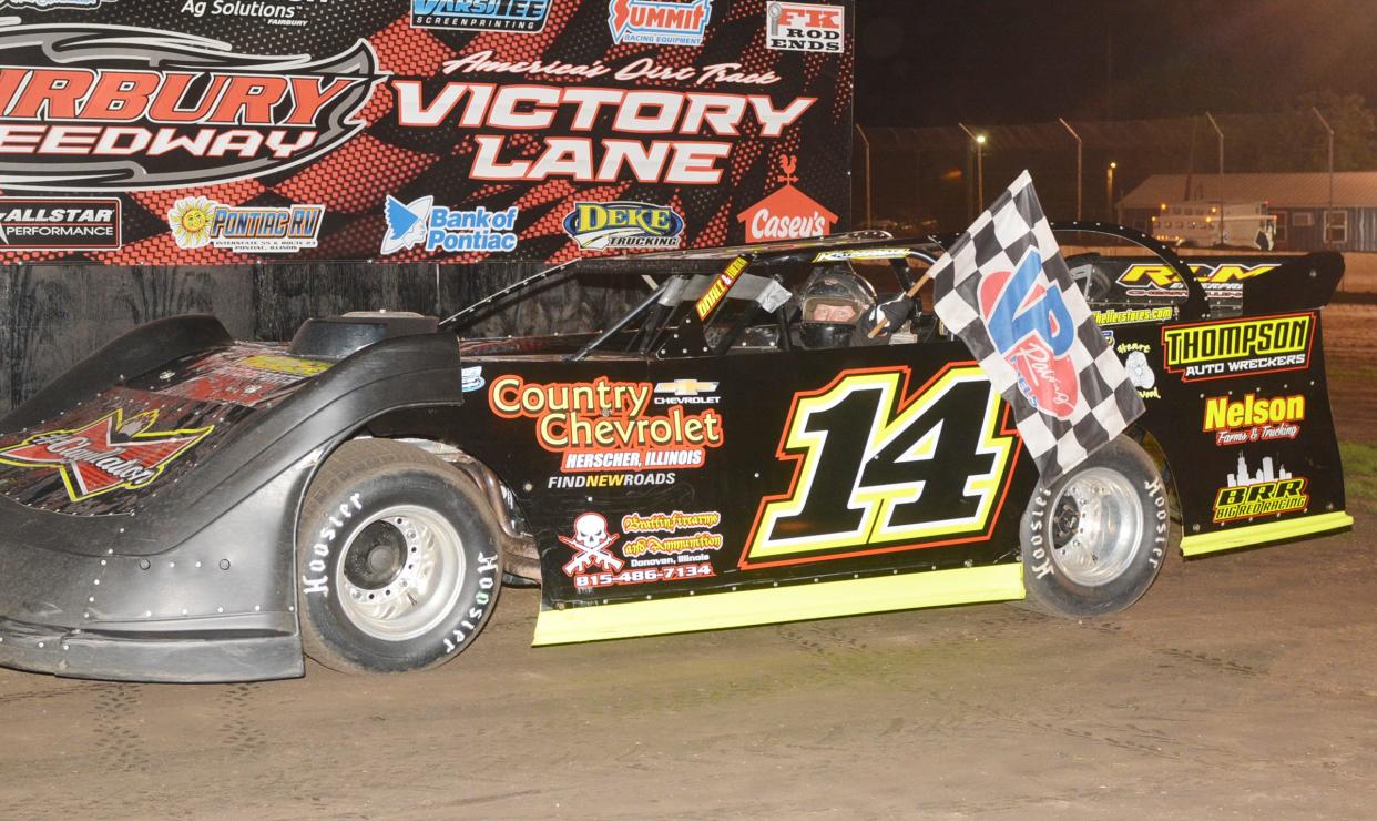 Glen Thompson, shown here after taking the checkered flag during a semi feature race last year at the Fairbury Speedway, was last year's Sportsmanship Award winner. He will be looking to claim his first career feature win this season.