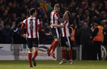 Britain Football Soccer - Lincoln City v Ipswich Town - FA Cup Third Round Replay - Sincil Bank - 17/1/17 Lincoln's Adam Marriott celebrates after the match with Alan Power Reuters / Darren Staples Livepic