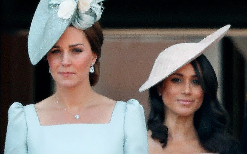 Catherine, Duchess of Cambridge and Meghan, Duchess of Sussex stand on the balcony of Buckingham Palace - Max Mumby/Indigo/Getty Images Europe