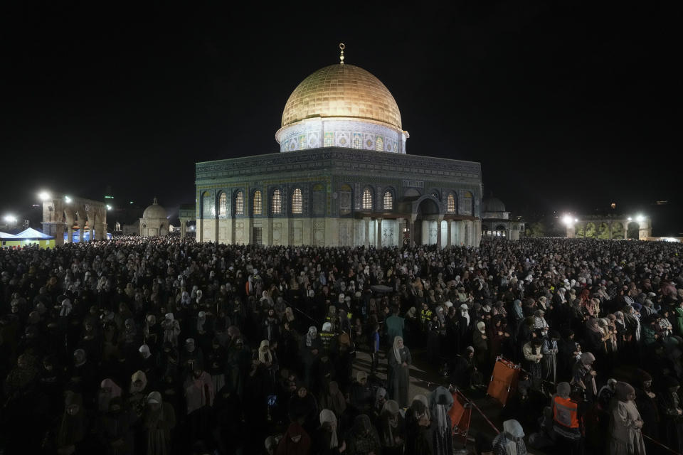 Palestinian Muslim worshippers pray during Laylat Al Qadr, also known as the Night of Destiny, in front of the Dome of the Rock, in the Al Aqsa Mosque compound in Jerusalem's Old City, Monday, April 17, 2023. Laylat Al Qadr is marked on the 27th day of the holy fasting month of Ramadan and is commemorated as the night Prophet Muhammad received the first revelation of the Quran. Muslims traditionally spend the night in prayer and devotion. (AP Photo/Mahmoud Illean)