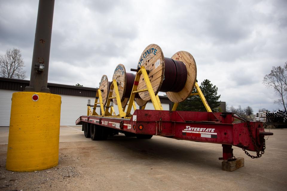 Coils of conduits in which fiber optic cable will be placed sit outside the Holland Board of Public Works Thursday, May 5, 2022.