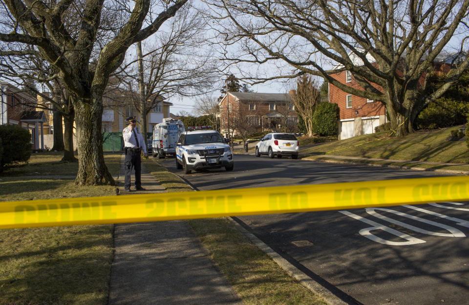 Police watch over the crime scene of the home of alleged Gambino family mafia crime boss Frank Cali following his shooting death on Wednesday. (Photo: Andrew Lichtenstein via Getty Images)