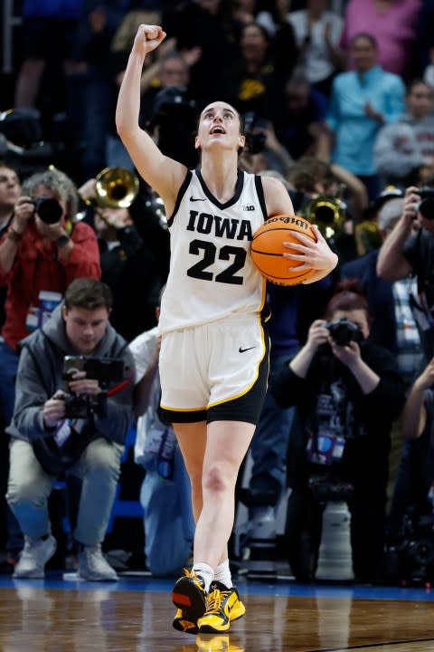 ALBANY, NEW YORK – APRIL 01: Caitlin Clark #22 of the Iowa Hawkeyes celebrates after beating the LSU Tigers 94-87 in the Elite 8 round of the NCAA Women’s Basketball Tournament at MVP Arena on April 01, 2024 in Albany, New York. (Photo by Sarah Stier/Getty Images)