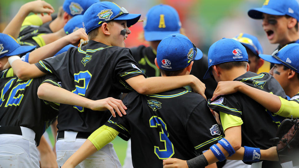 The Australia team from the Gold Coast huddles during Game 9 of the 2018 Little League World Series against the Caribbean team from Puerto Rico. (Photo by Alex Trautwig/MLB Photos via Getty Images)