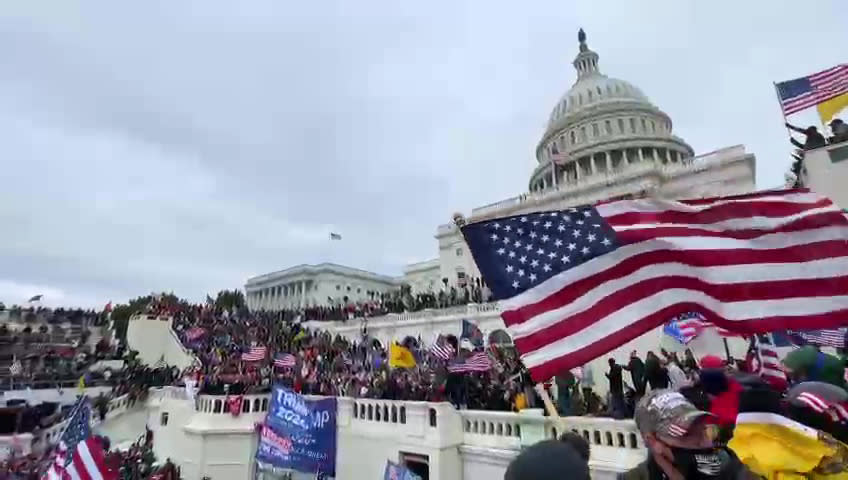 WASHINGTON D.C., USA - JANUARY 6: A screen grab captured from a video shows US President Donald Trumps supporters gather outside the Capitol building in Washington D.C., United States on January 06, 2021. Pro-Trump rioters stormed the US Capitol as lawmakers were set to sign off Wednesday on President-elect Joe Biden's electoral victory in what was supposed to be a routine process headed to Inauguration Day. (Photo by Lokman Vural Elibol/Anadolu Agency via Getty Images)