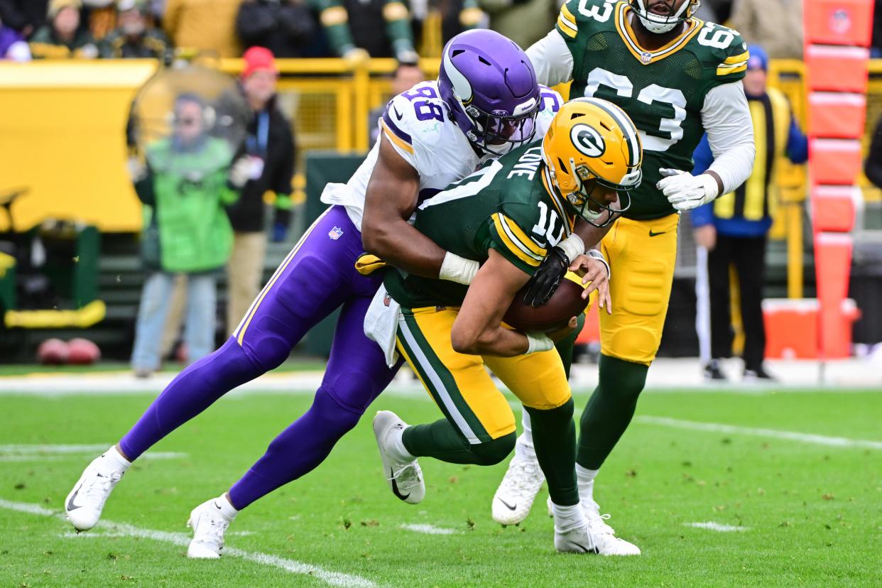 Vikings edge rusher D.J. Wonnum sacking Green Bay's Jordan Love last season.