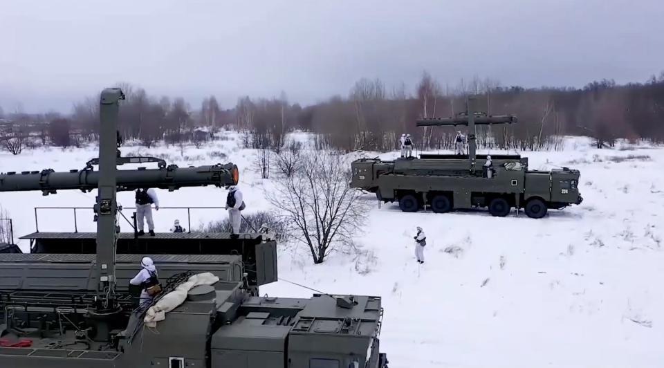 Screenshot of video from Russia's Western Military District showing drills with soldiers, tanks, and missile launchers