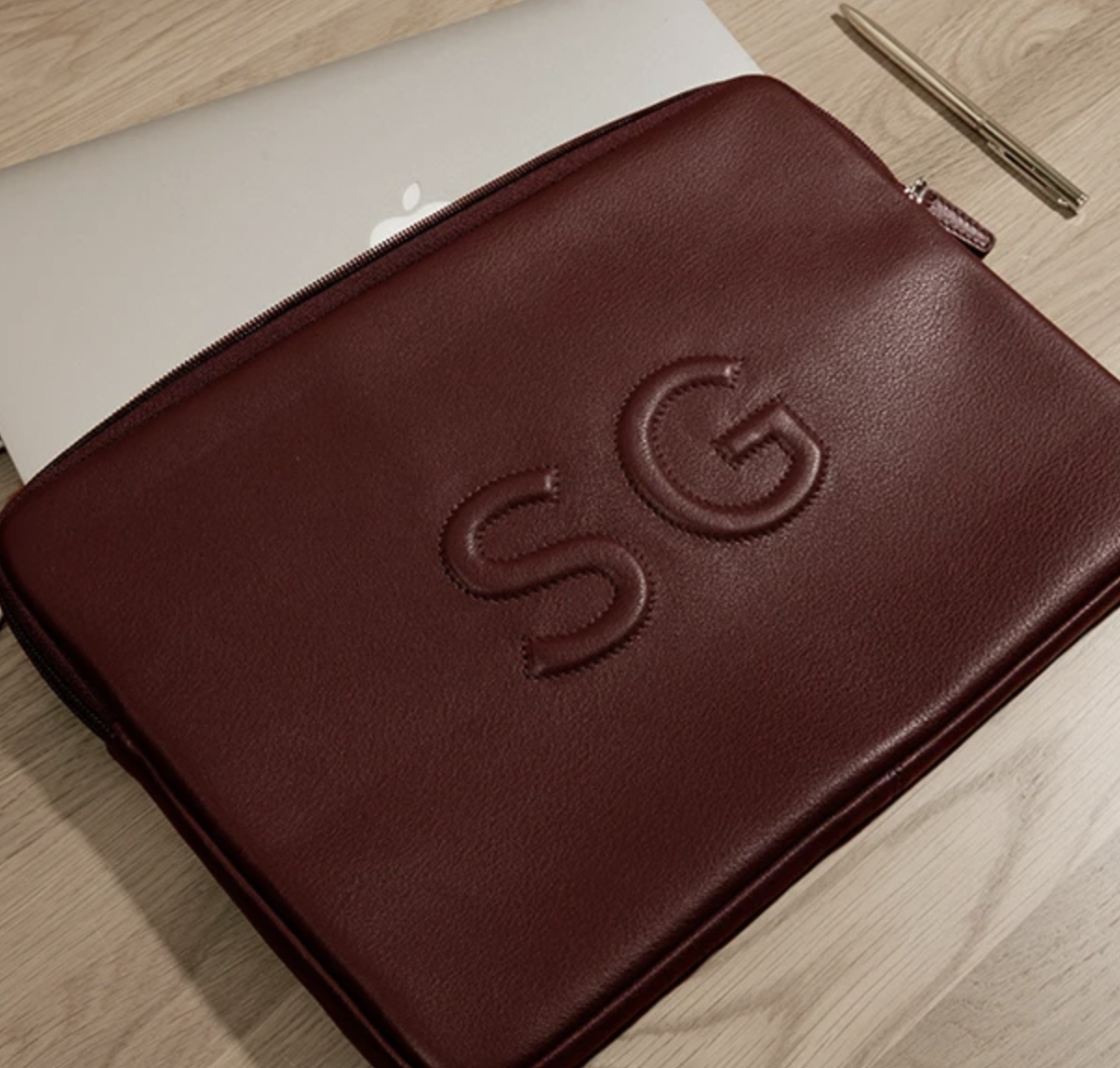 <p><a href="https://go.redirectingat.com?id=74968X1596630&url=https%3A%2F%2Fwww.leatherology.com%2Fleather-macbook-sleeve%3Fcolor%3Dbrown%26style%3D046%26gad_source%3D1%26gclid%3DCjwKCAjwrcKxBhBMEiwAIVF8rDeS-9jzJxVbcDEKU4arA-CiSee2ZXnmWITgf3dR4ZRa-fbvbVDmqRoCreQQAvD_BwE&sref=https%3A%2F%2Fwww.thepioneerwoman.com%2Fholidays-celebrations%2Fgifts%2Fg39717196%2Fgifts-for-godfather%2F" rel="nofollow noopener" target="_blank" data-ylk="slk:Shop Now;elm:context_link;itc:0;sec:content-canvas" class="link rapid-noclick-resp">Shop Now</a></p><p>Leather Laptop Case</p><p>leatherology.com</p><p>$110.00</p><span class="copyright">Leatherology</span>