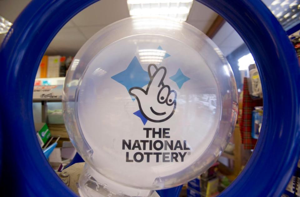 A National Lottery kiosk in a newsagent in north London (Yui Mok/PA) (PA Archive)
