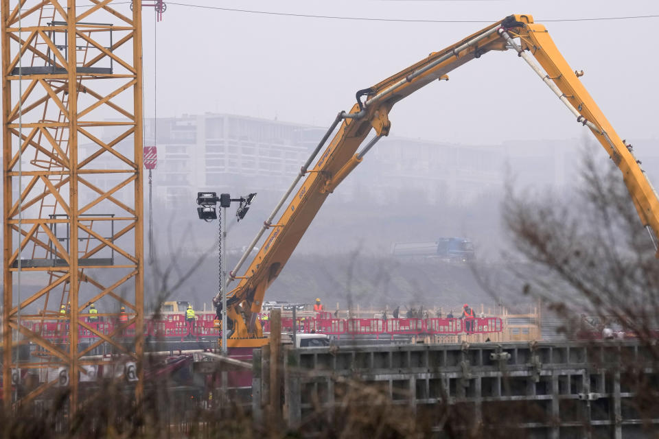 A view of the construction site of the Palaitalia at the Santa Giulia district, in Milan, Italy, Tuesday, Feb. 6, 2024. The 2026 Milan-Cortina Olympics start exactly two years from Tuesday and it still seems like there are more questions than answers for a complicated games that will be staged across a large swath of northern Italy spread between five different venue clusters. (AP Photo/Antonio Calanni)