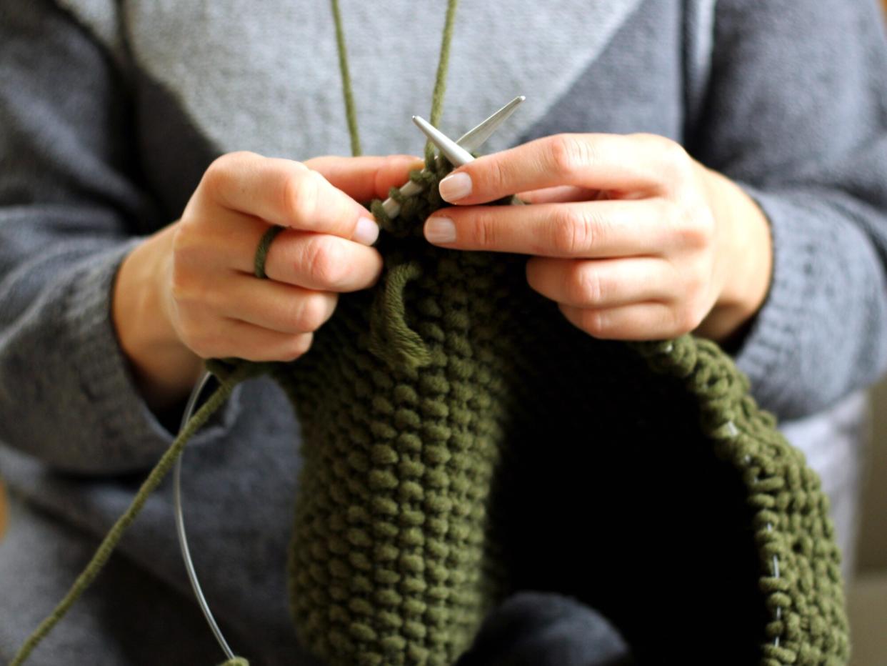 woman hands knitting