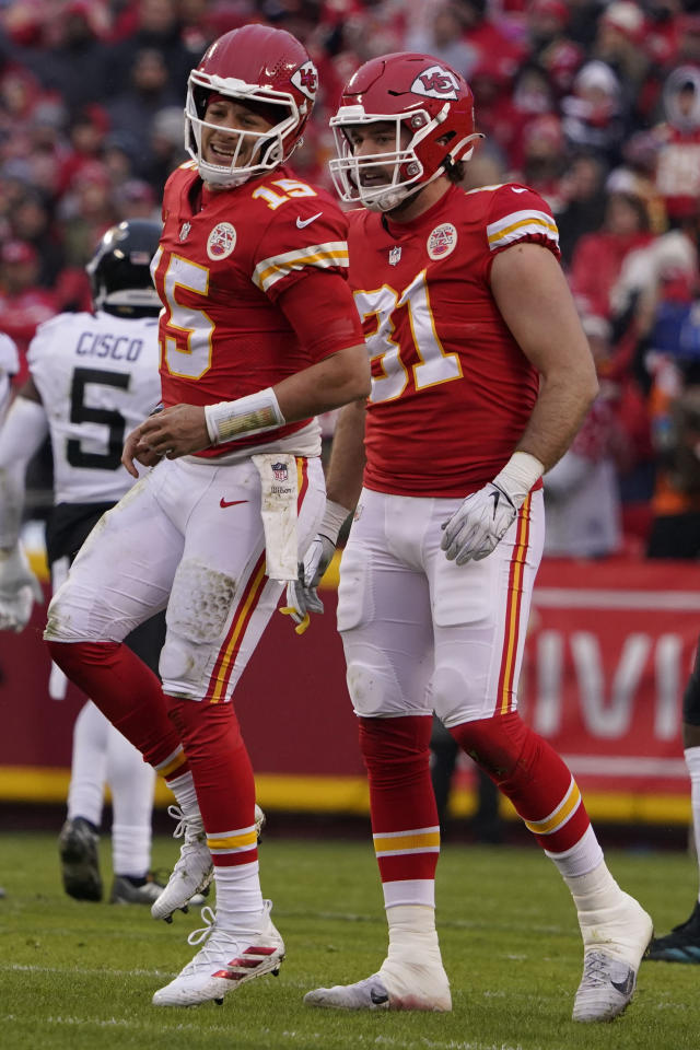 Kansas City Chiefs quarterback Patrick Mahomes (15) celebrates after  throwing a touchdown pass during the first half of an NFL divisional round  playoff football game against the Buffalo Bills, Sunday, Jan. 23