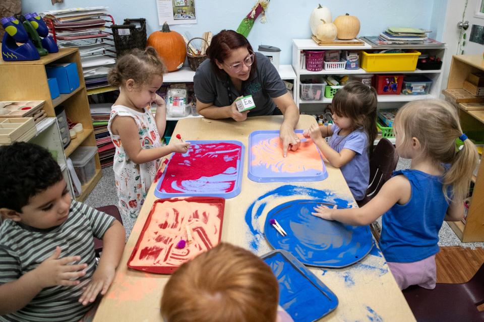 Gladimar de Jesus works with children in her 2-3 year-old classroom on Monday, Oct. 9, 2023, at Child’s Path in Naples. Child care centers have to find new avenues of support to replace subsidies from the federal government under the American Rescue Plan that ended Sept. 30.