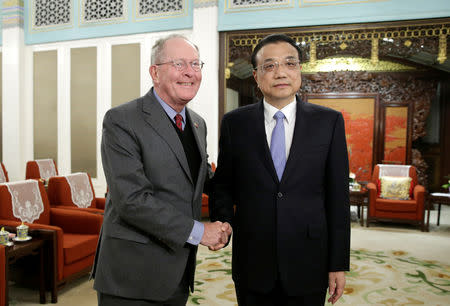 China's Premier Li Keqiang (R) shakes hands with Tennessee Senator Lamar Alexander during a meeting with a group of U.S. Republican senators and Congress members at Zhongnanhai leadership compound in Beijing, China, November 1, 2018. REUTERS/Jason Lee/Pool