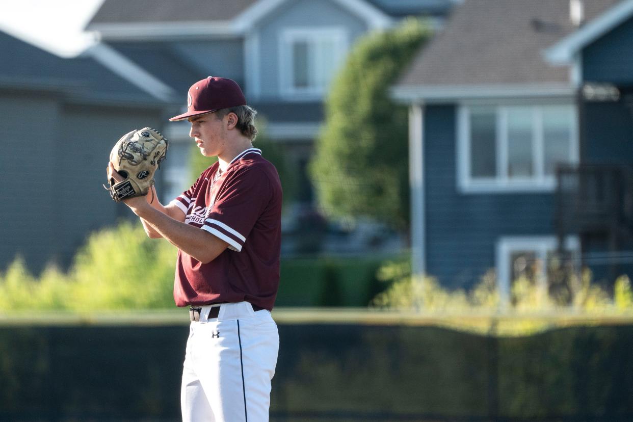 Dowling Catholic's Trever Baumler prepares to pitch during a substate baseball game at Ankeny Centennial High School on Wednesday, July 17, 2024, in Ankeny.