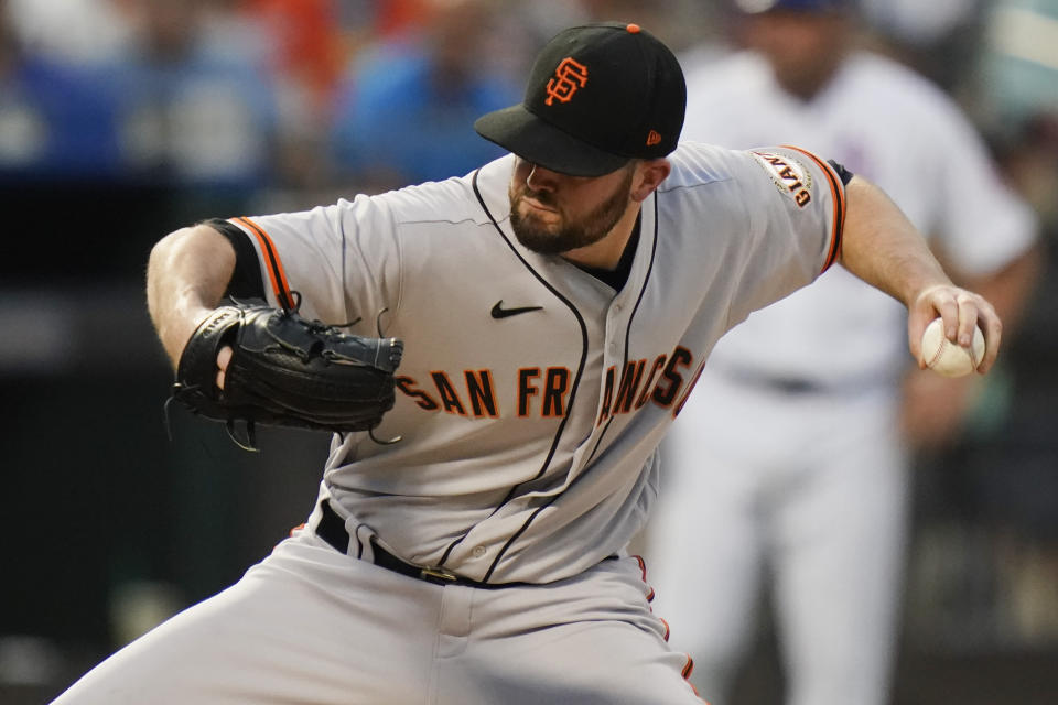 San Francisco Giants' Alex Wood winds up during the first inning of the team's baseball game against the New York Mets on Thursday, Aug. 26, 2021, in New York. (AP Photo/Frank Franklin II)